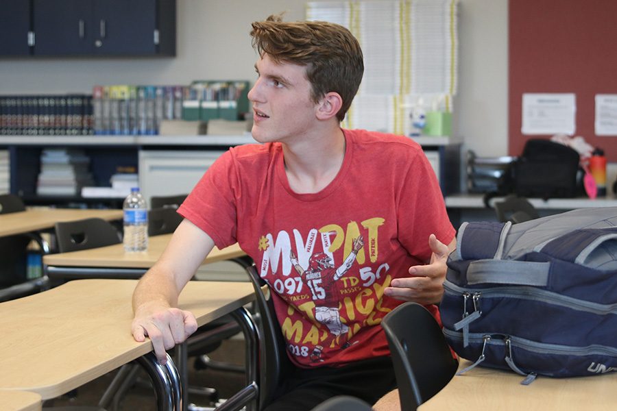 Towards the end of the meeting, junior Michael Brown discusses his views on Senator Elizabeth Warren.