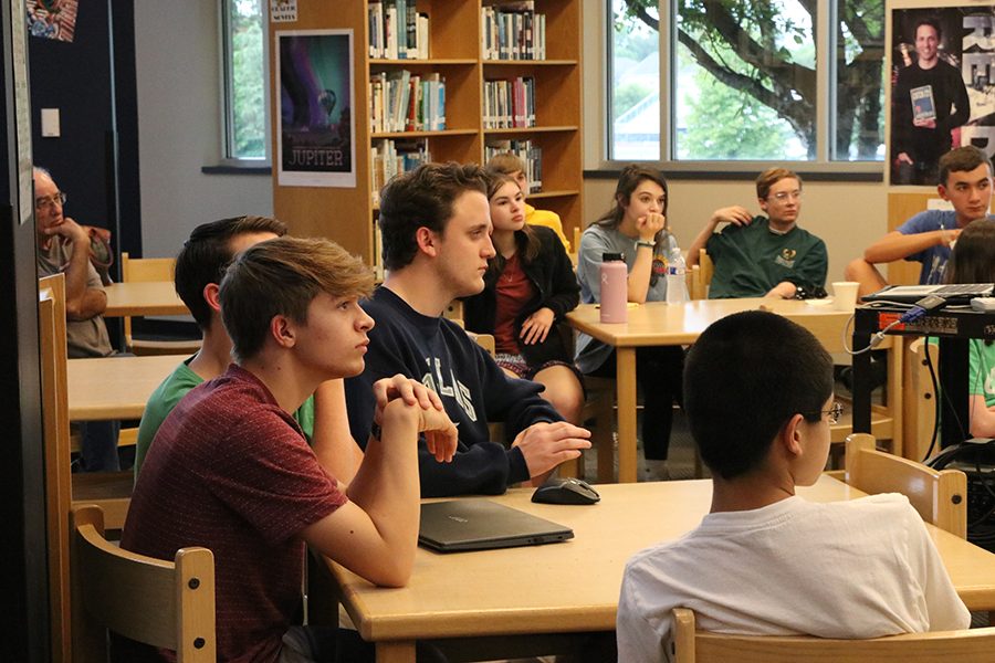 Students gather in the library to listen to a guest speaker Mona Lyne before watching the Democratic debate.
