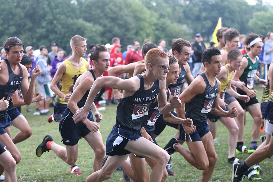 Starting strong, boys Varsity runs ahead of their competitors.