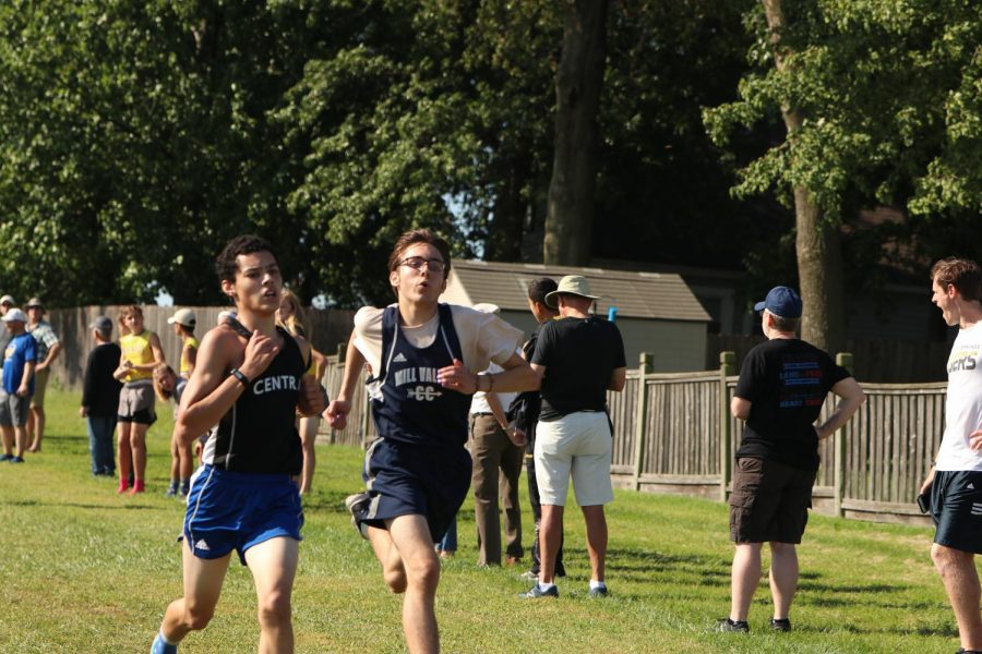 Sprinting past his opponent, sophomore Nicholas Botkin gets closer to the end of the race.