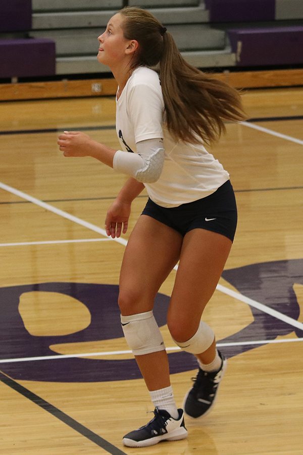 Concentrating  the ball, junior Jaden Ravnsborg  readies herself to pass the ball to her teammates.