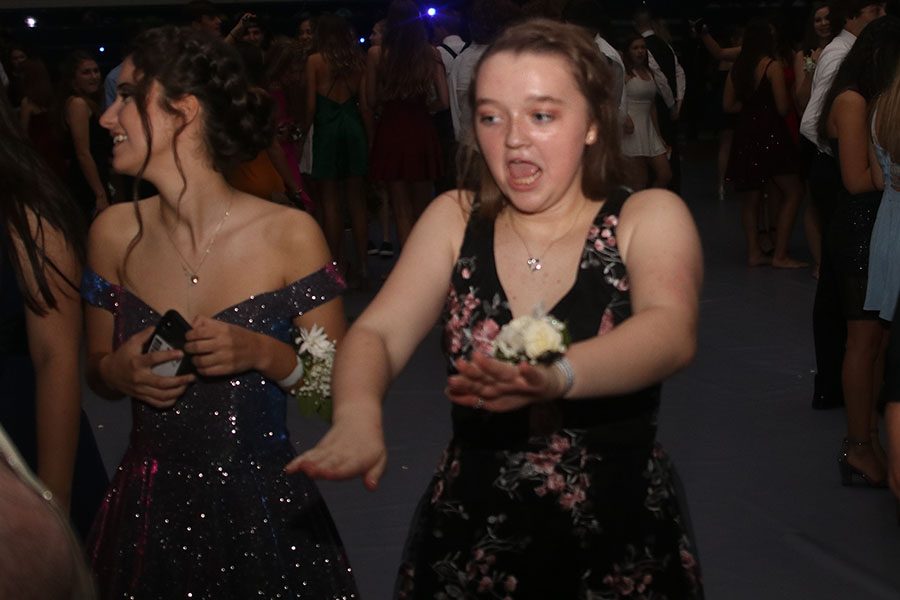 Junior Madison Larson dances with friends.