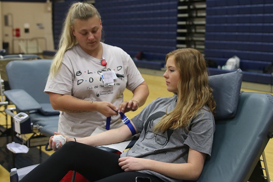 At+the+HOSA+sponsored+blood+drive+on+Wednesday%2C+Oct.+5%2C+senior+Rachael+Kinkade+prepares+to+donate+blood.