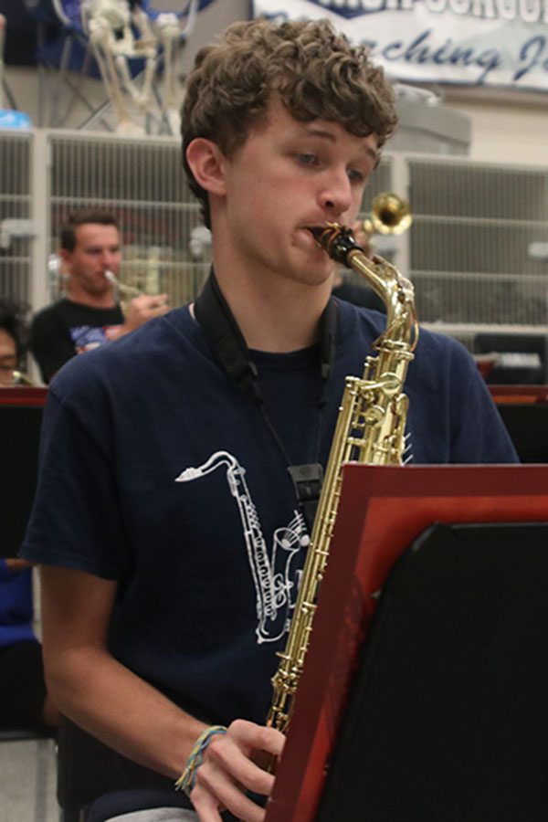 During Jazz Band on Friday, Oct 5, junior John Fraka performs a solo.