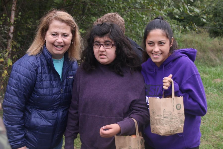 Mother and daughter Shannon and Ali Greenhalgh take a group photo with Alyssa Frias.
