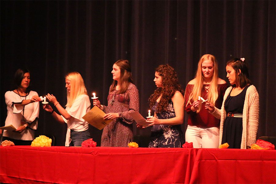 During the Spanish NHS induction ceremony Wednesday Oct. 16, new and returning members lit candles for the initiation. 