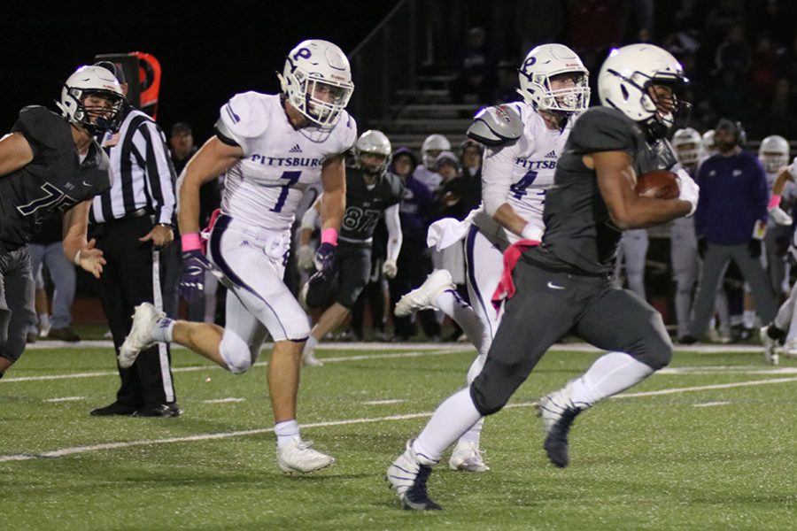 Running back Tyler Green breaks away from the Pittsburg defense on a 44 yard carry. 