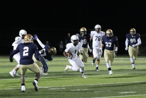 Quin Wittenauer bolts down the field cutting through the open line of defense.