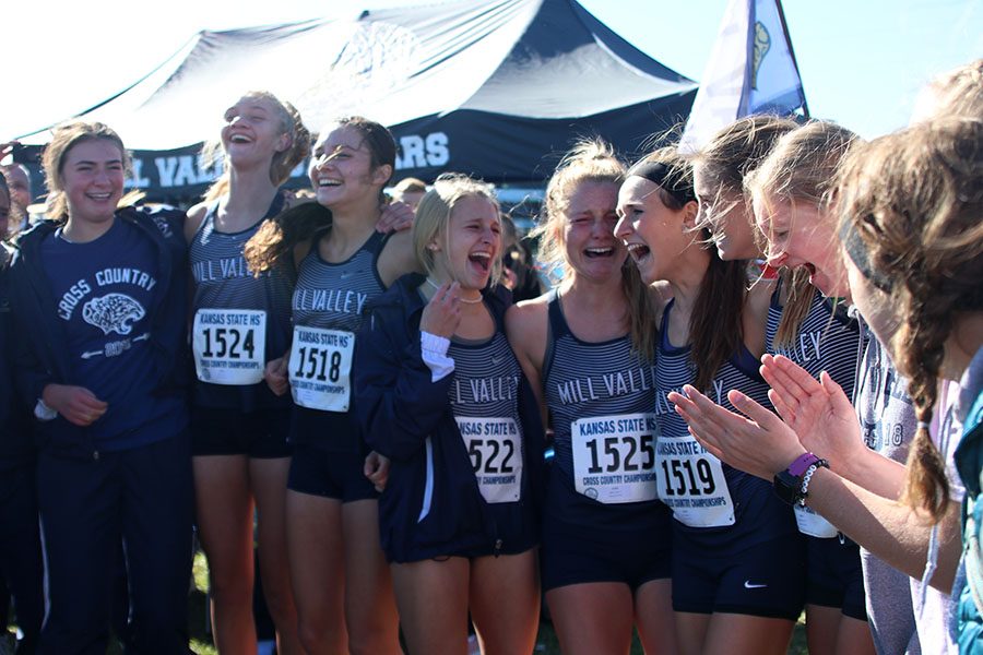 Shortly after racing, the girls cross country team discovers they have won another state championship.