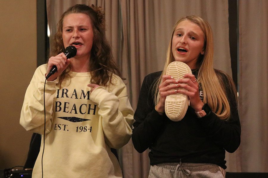 Side by side, sophomores Lauren Walker and Bridget Roy lip synch to the song Just Wanna Be With You from High School Musical 3.
