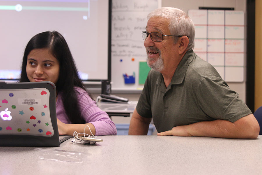  During class, para Mike Pierce helps the students he is assigned with study for their upcoming vocabulary test.
