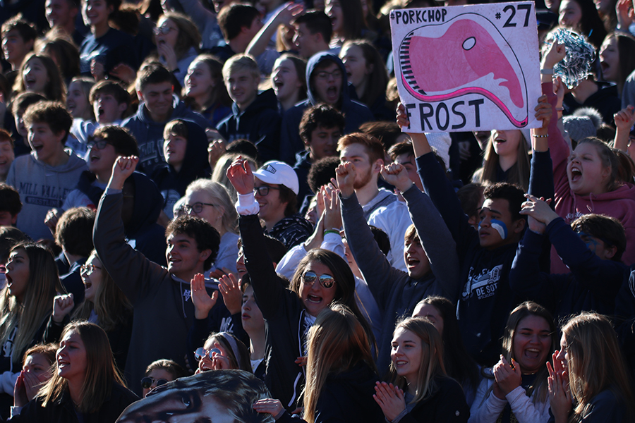 Getting hyped up after a touchdown, Mill Valley student section cheers for their offense.
