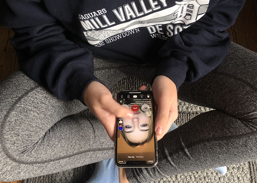 Scrolling through TikTok, junior Lexi Claeys sees what others have posted. 