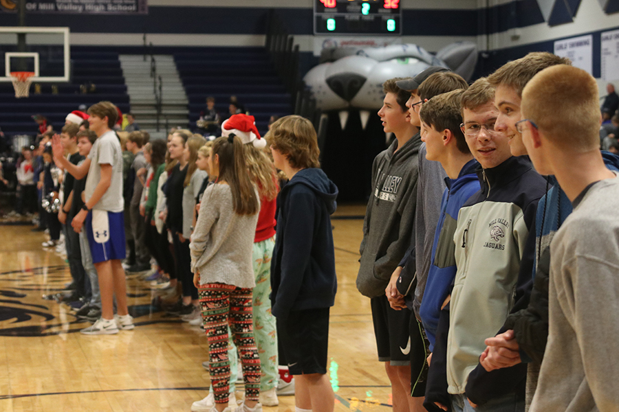 Students+lined+the+gym+to+be+recognised+for+making+it+on+the+Honor+Roll.+Students+whose+GPAs+exceeded+3.7+had+the+opportunity+to+be+recognized+at+the+basketball+game+Friday%2C+Dec.+6.