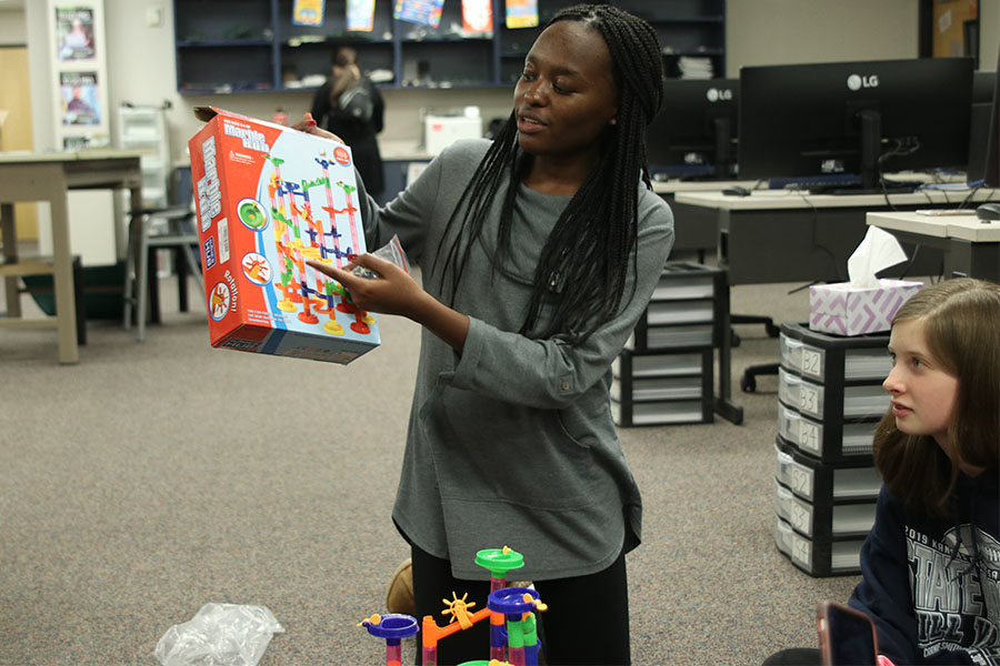 During the Society of Women Engineers meeting Wednesday, Dec. 4, founder Courtney Mahugu gives the members a task where they must put together a functioning Marble Run set without verbally communicating. 
