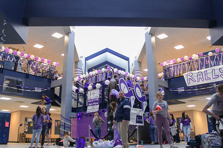 Relay for Life committee members decorate the school for purple bomb in order to promote upcoming Relay for Life events. The entire  main entrance was flooded with purple. 