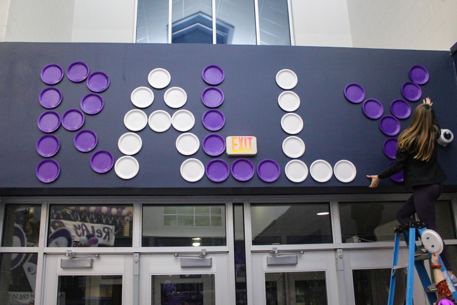 On the opposite side of RELAY, senior Molly Haymaker creates a matching display that says RALLY. 