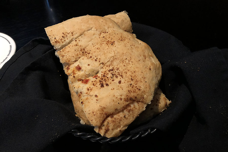 A side of warm bread offered with the lunch.