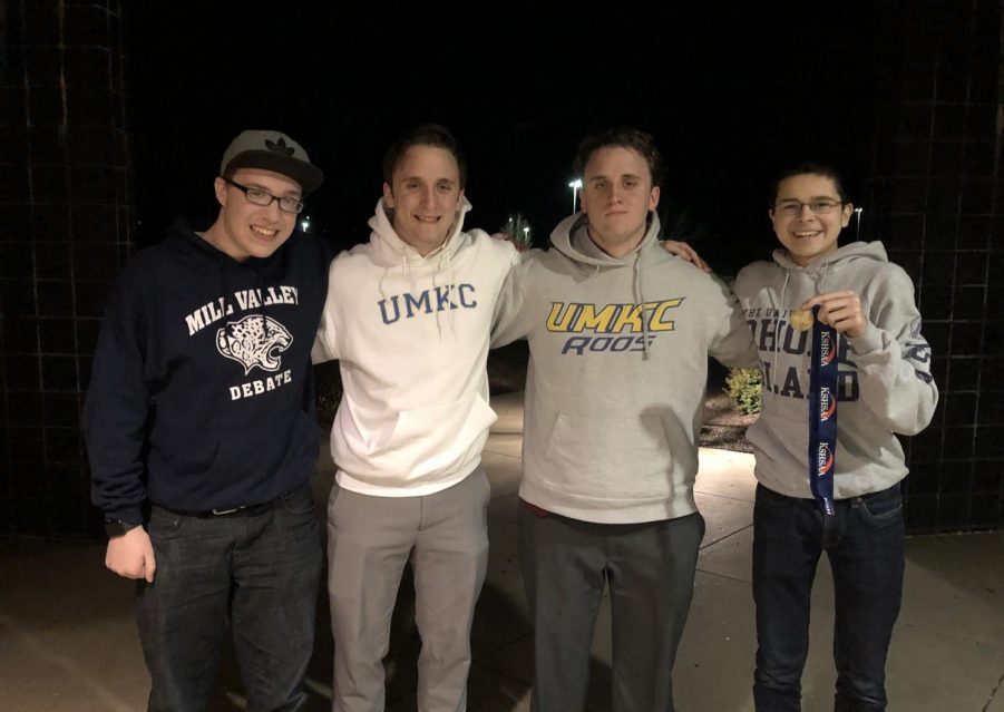 Juniors Adam White (right) and Tanner Smith (left) and seniors Thomas Babcock (second left) and Travis Babcock (second right) won the teams first state elimination rounds in school history Saturday, Jan. 18.