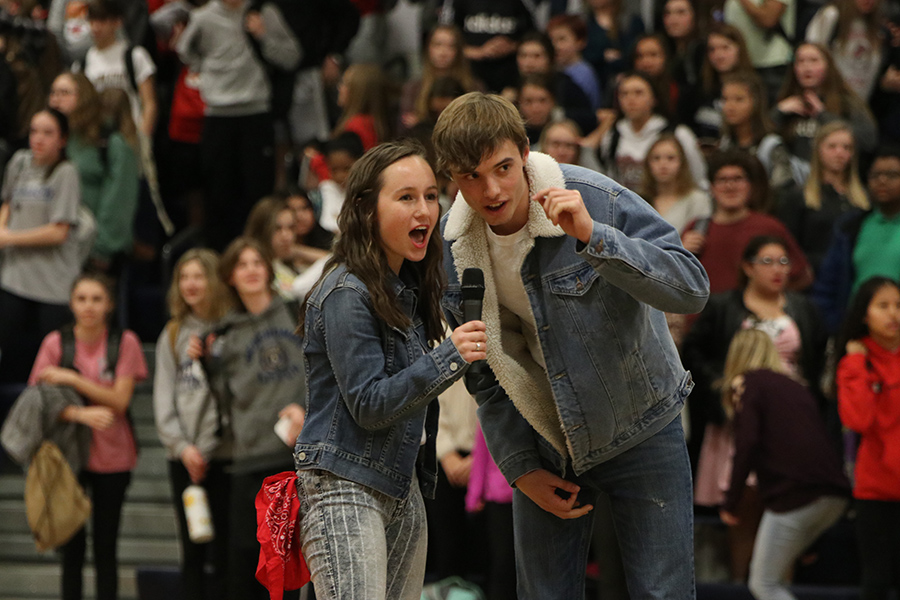 The winning dancers, seniors Rylee McElroy and Josh Glunt, finish off the assembly with the classic Hey, hey, what do you say? school spirit cheer.
