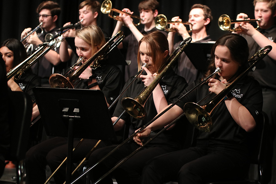 Jazz band performs concert showcasing seven different music pieces