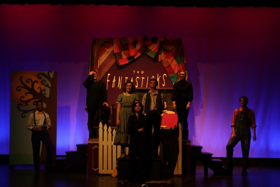 All four performers in the Repertory Theatre musical Fantasticks stand at the end of a song. 