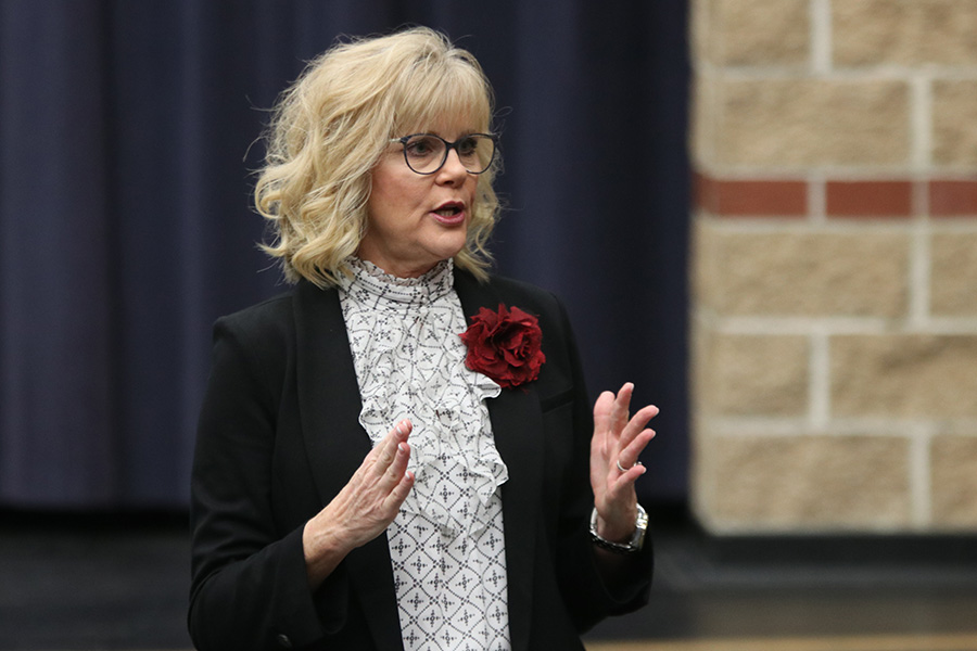 After being introduced to the faculty, new principal Jill Holder greets the teachers Wednesday, Feb. 12.