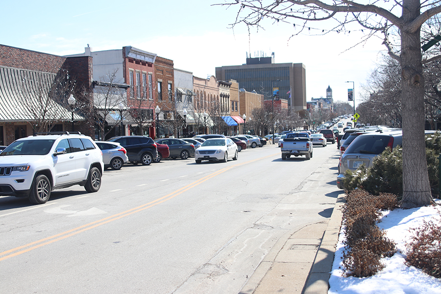 Massachusetts street in Lawrence Kansas offers a variety of shops and restaurants such as Love Garden Sounds and The Burger Stand.

