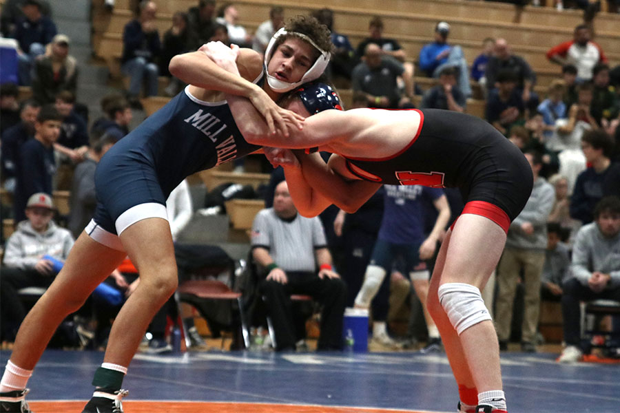 During+the+regional+tournament+on+Saturday%2C+Feb.+22%2C+senior+Zach+Keal+wrestles+with+his+opponent.+Keal+went+on+to+take+first+place+in+the+132-pound+weight+class.