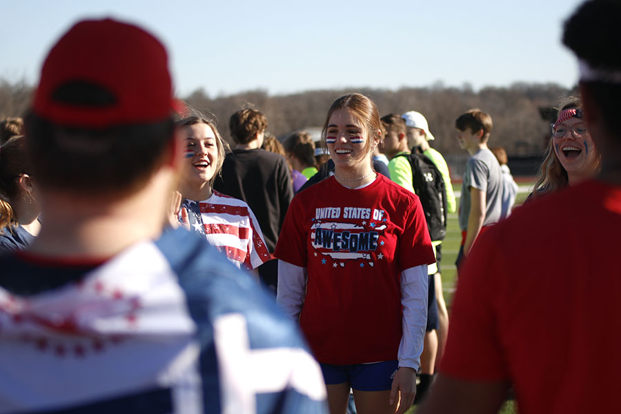 Smiling, junior Ellie Boone introduces herself to her team.