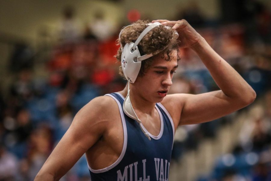 Walking off the mat with blood dripping down his lips, senior Zach Keal clinches another win against Topeka-Washburn Rural, earning him the 5A/6A state championship wrestling title Saturday, Feb. 29. “I have been working hard for the past four years all in an effort to reach my biggest goal of winning state,” Keal said. “The team kept pushing one another so hard for this outcome; it will be sad to leave. I am so proud of all that Mill Valley wrestling has accomplished while I’ve been here.” 