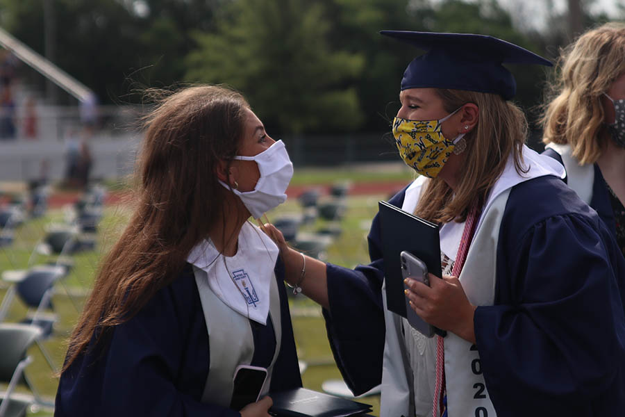 After the ceremony, seniors Dilara King and Ashley Grega rushed to each other as they left the field. 