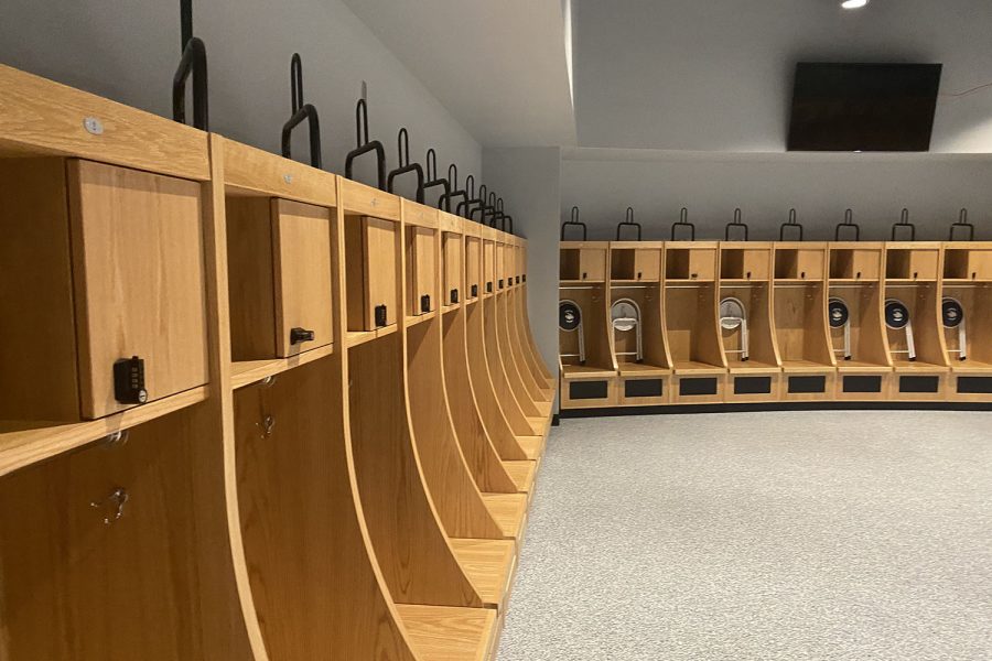 In the new field house, the varsity football locker room is very open so the coaches can easily speak to the entire team.