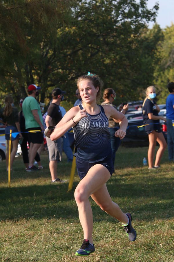 In the final stretch of the race, senior Molly Ricker sprints toward the finish line.
