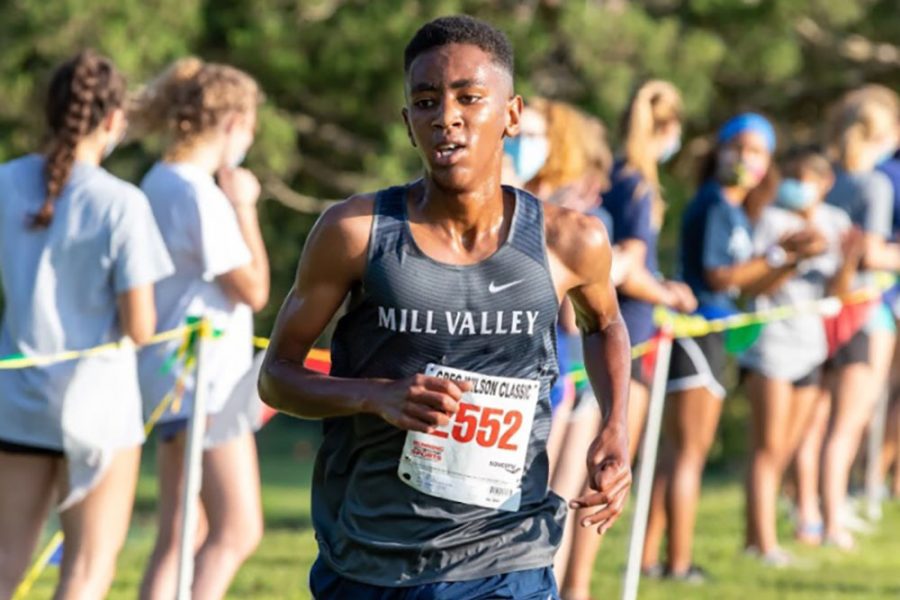 Sprinting to secure his placement, freshman AJ Vega finishes in fifth place with a time of 17:10 at the DeSoto Triangular meet Saturday, Sept. 4