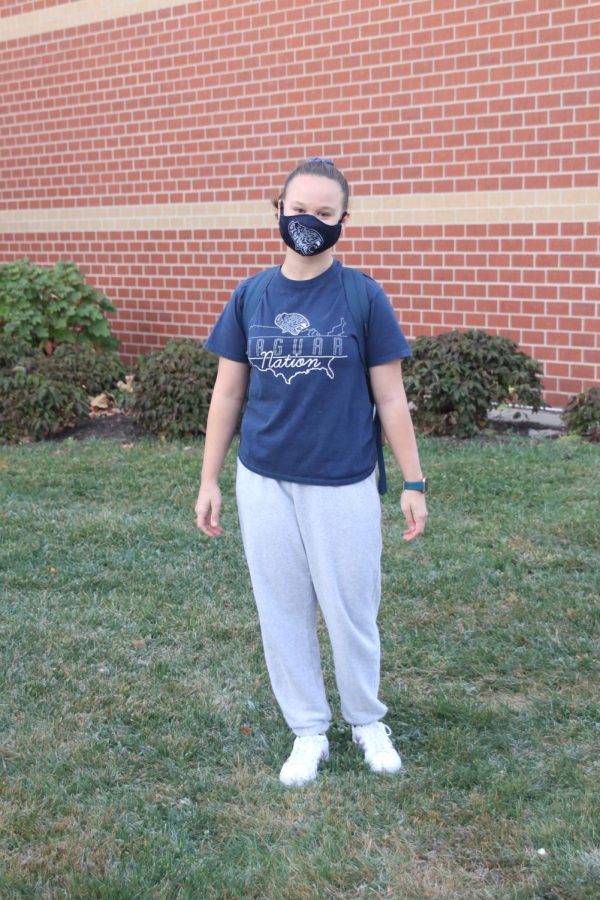 Ready to show some school spirit is sophomore Cassandra Frias in her jaguar nation shirt and jaguar mask.