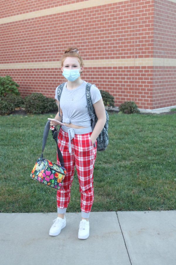 Standing at the entrance of Mill Valley, junior Audrey Zade smiles in her comfy PJ pants. 