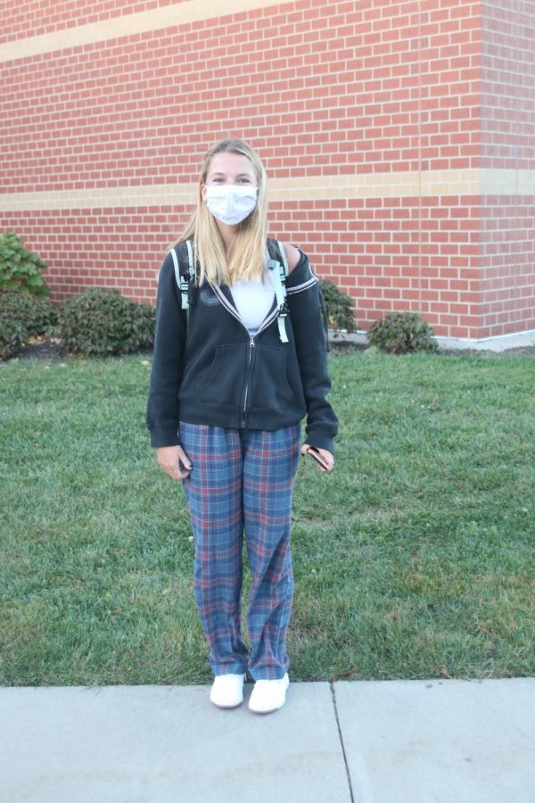 Pictured in her plaid PJs is sophomore Emma Nentwig in her homecoming spirit wear.