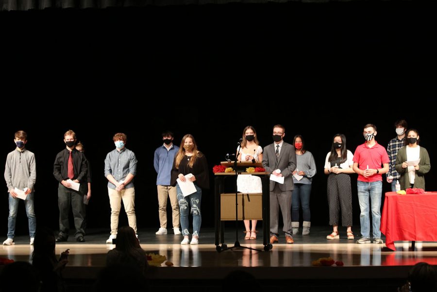 After all members lighted their candles, the newest inductees stood together on the stage to be recognized.