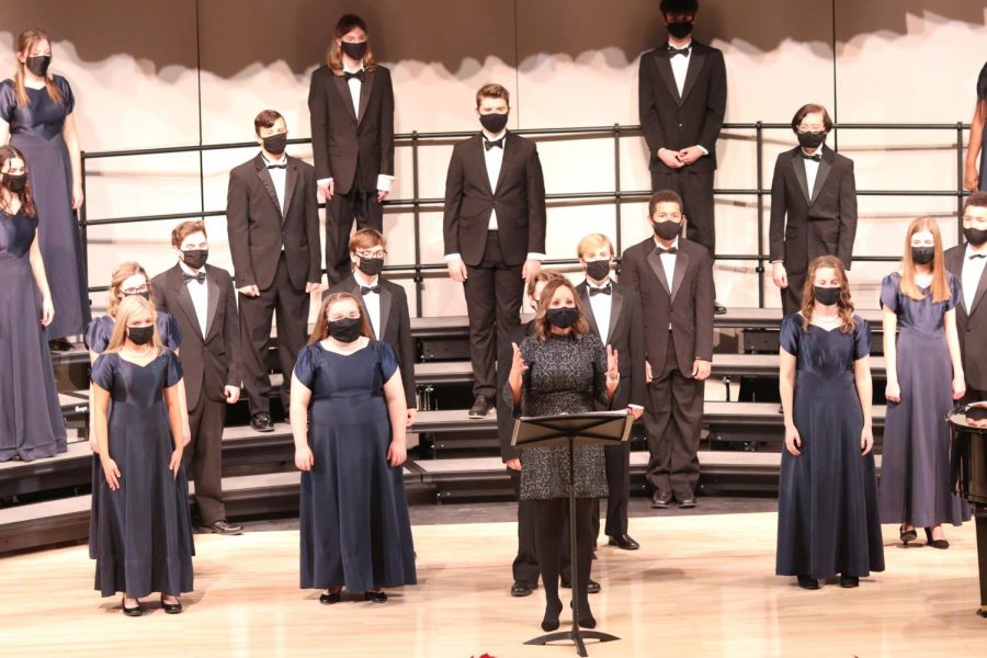 Choir teacher Jessie Reimer opens the winter concert with a speech directed to livestream viewers as well as her various choirs. Offering words of consolement and encouragement, she raises up spirits of those inside and outside the theatre that night.