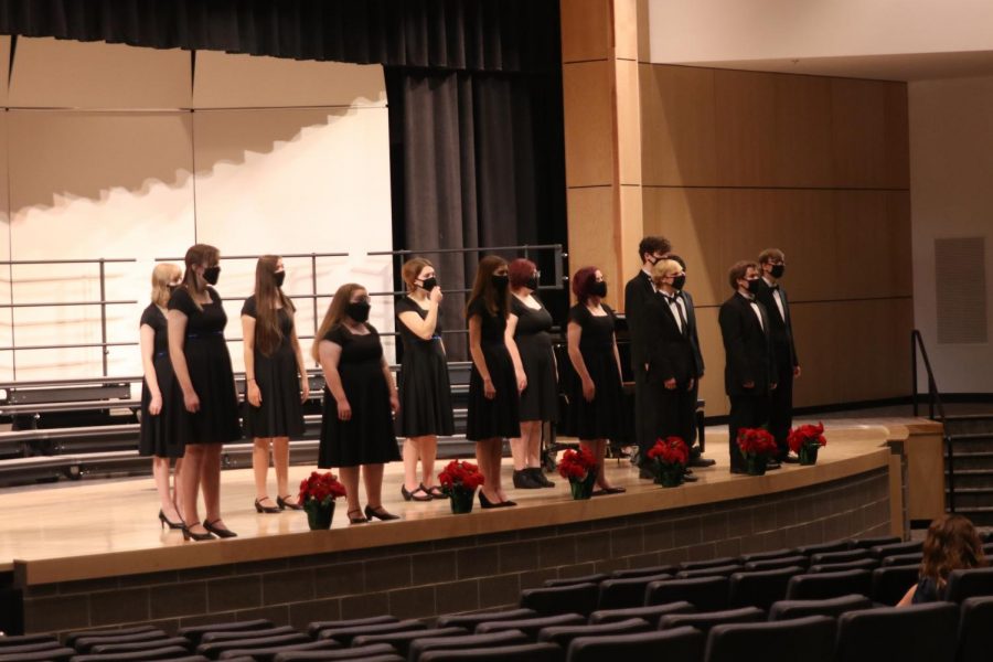 Jag Singers line up front and center to sing “Have Yourself a Merry Little Christmas” to end the concert on a happy note. Having practiced diligently in order to sing without a conductor, the group sang without any aid from choir teacher Jessie Reimer.