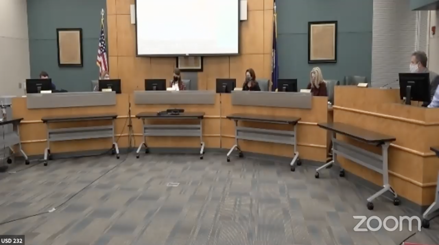 The school board meets to discuss COVID-19 gating criteria. 