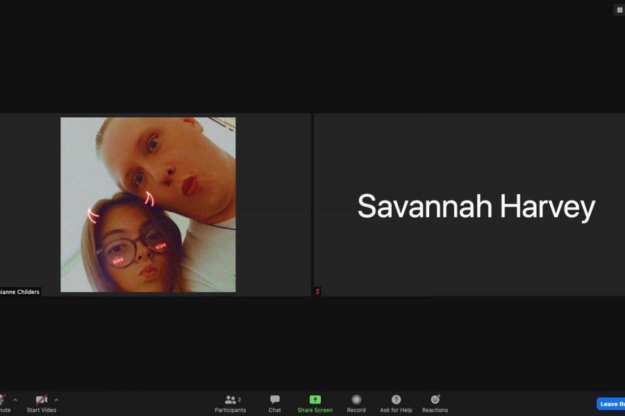 While being in a zoom call, Savannah Harvey sits with Shianne Childers with their cameras off during class.