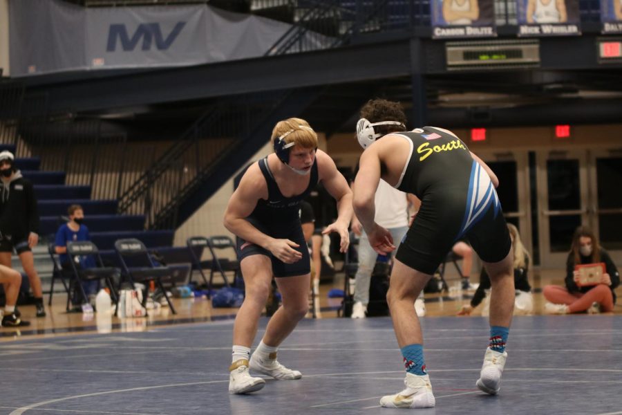 With eyes locked on one another, freshman Holden Zigmant circles his opponent before striking.