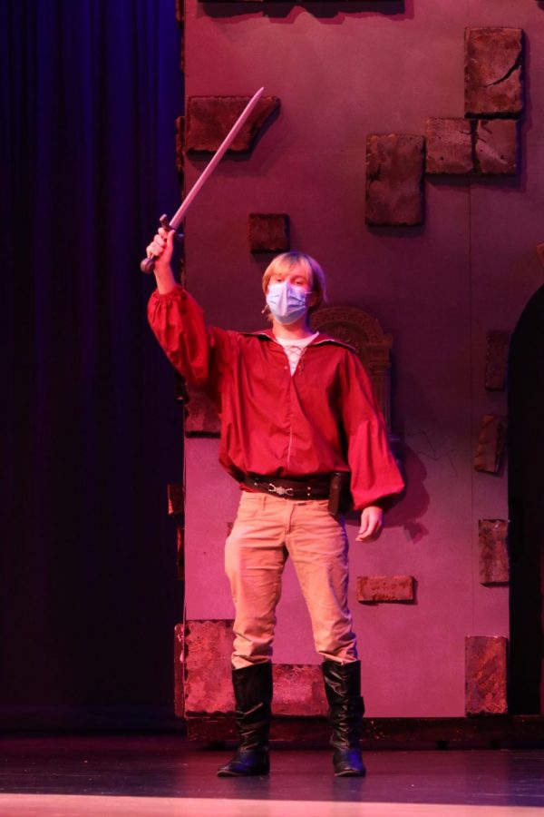 Practicing singing one of his parts in The Pirates of Penzance, sophomore Carter Harvey is set to play Frederic. The musicals Sullivan cast is scheduled to perform on Thursday, Feb. 18.