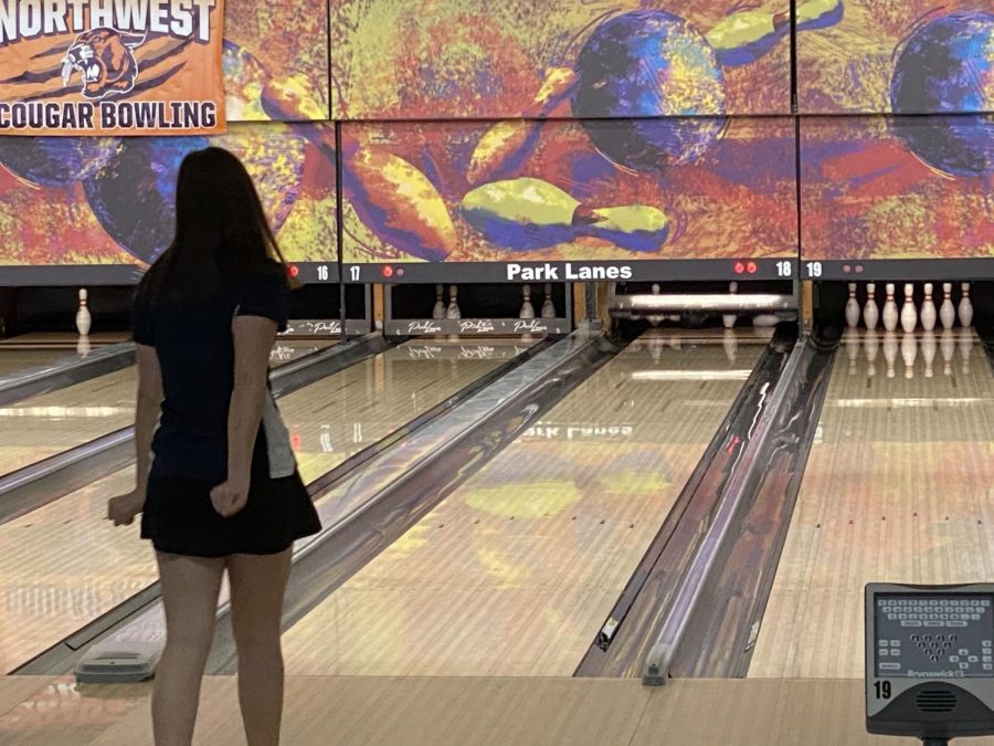 Waiting in anticipation, senior Sophie Hannam successfully bowls a strike.