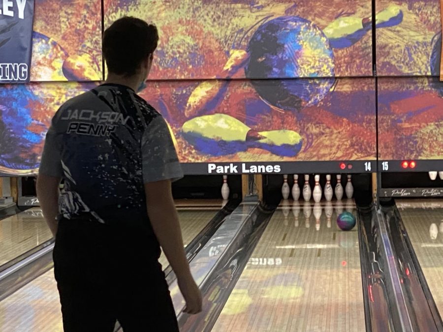 Watching, senior Jackson Penny was able to curve the ball so it could hit the pins at a better angle.