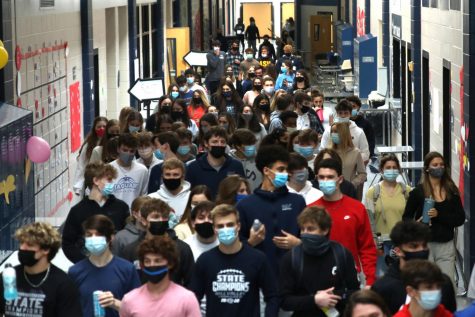 After a lunch is over, every student within that lunch time slot leaves the cafeteria shoulder to shoulder.