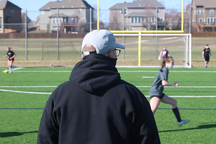 Shouting from midfield Coach Waldron sometimes has to help the players with some strategy 