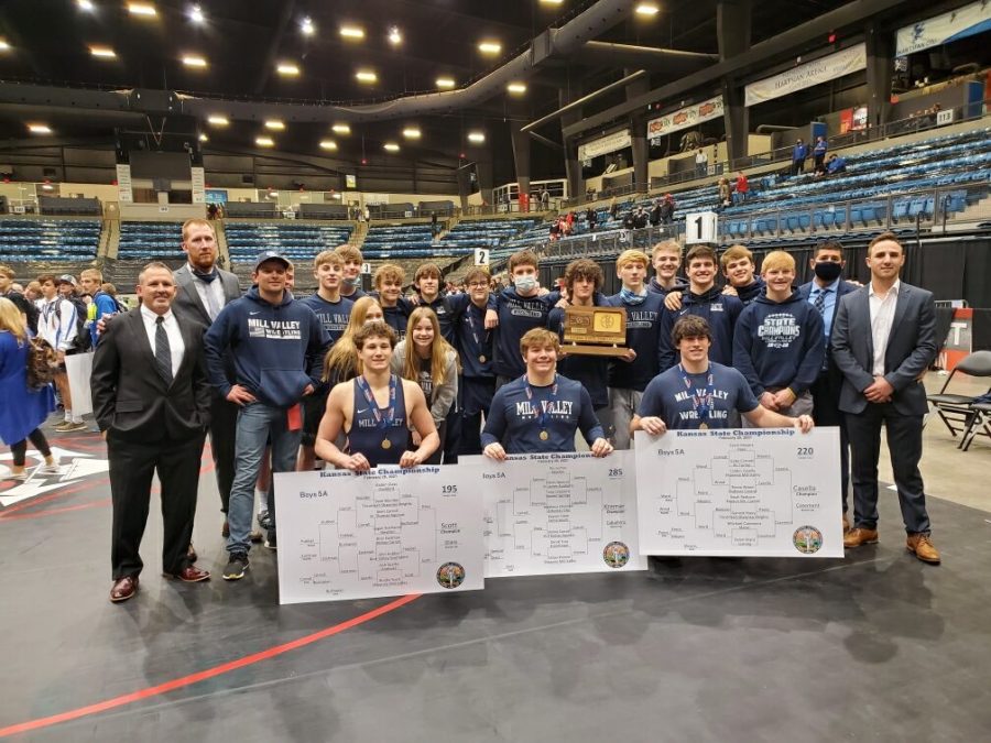 After placing third at the state tournament, the wrestling team poses for a picture